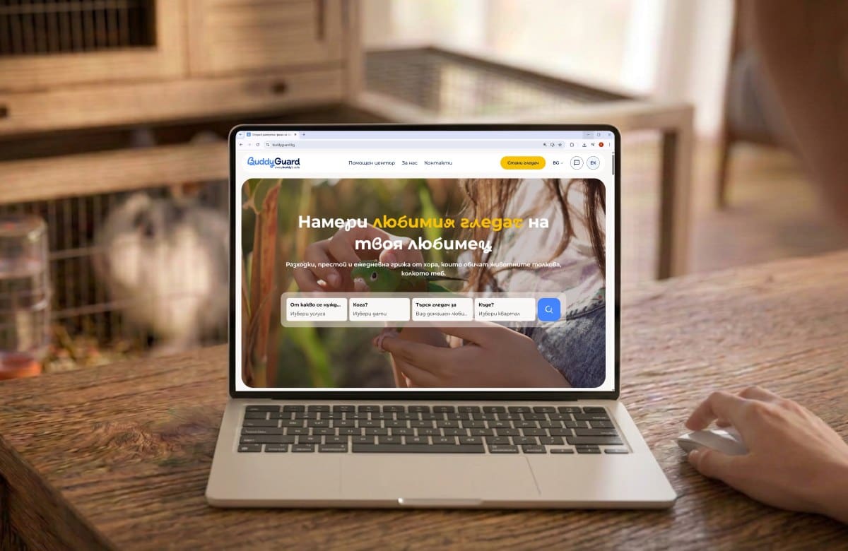 BuddyGuard website on a laptop beside a rabbit hutch